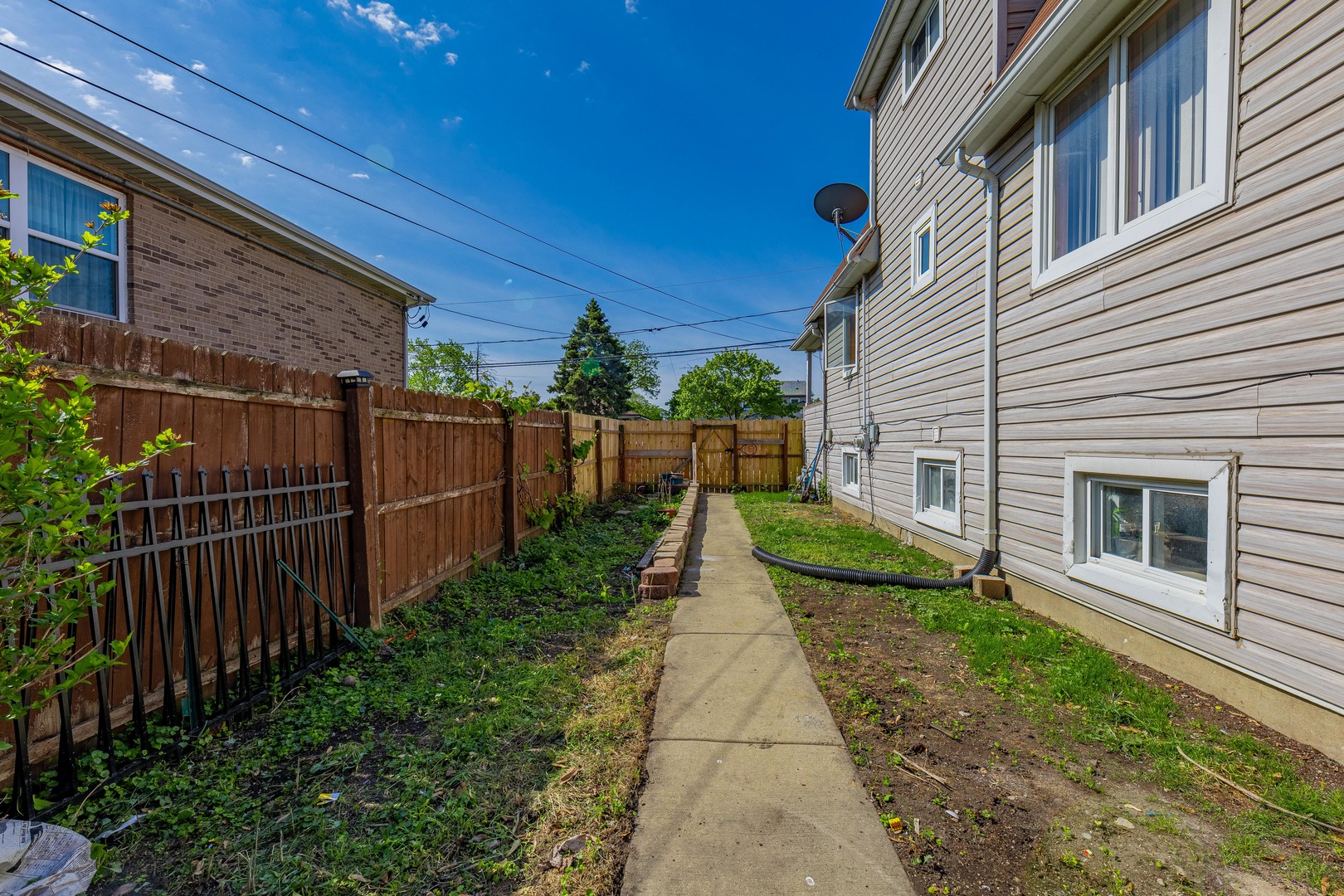 5844 West Maple Avenue Berkeley, IL 60163 - Photo 40 of 46 a view of a pathway with a house