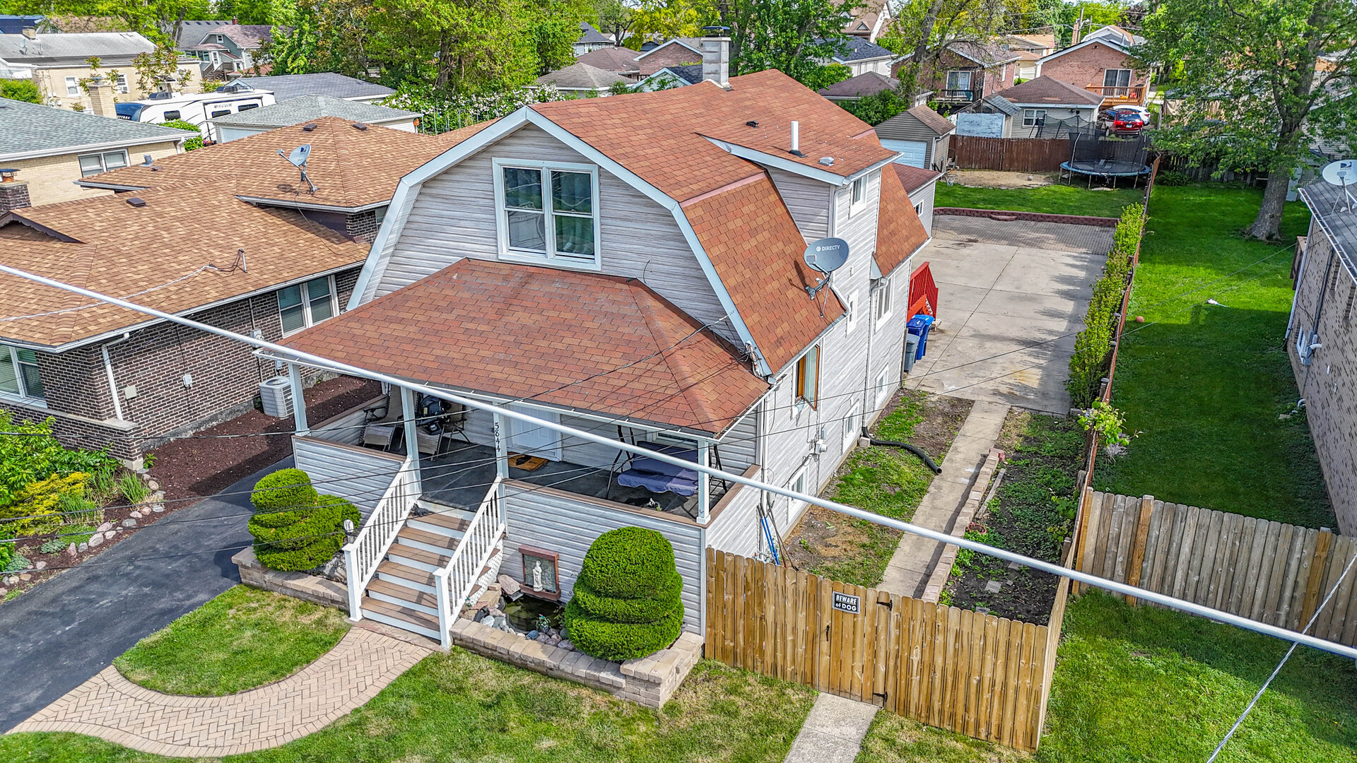 5844 West Maple Avenue Berkeley, IL 60163 - Photo 42 of 46 an aerial view of a house with a yard