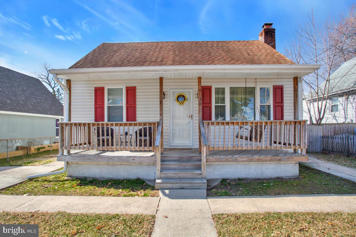 8130 Edgewater Road Baltimore, MD 21226 - Photo 2 of 39 Covered Front Porch w/ swing