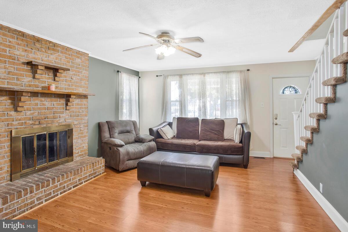 8130 Edgewater Road Baltimore, MD 21226 - Photo 6 of 39 LR w/ Gleaming Hrd Wd floor & Fireplace w/Mantle
