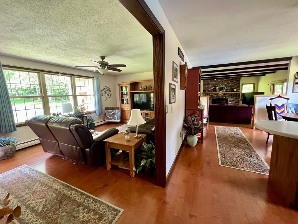 22 Franklin Road Gill, MA 01354 - Photo 15 of 28 a living room with furniture and a window