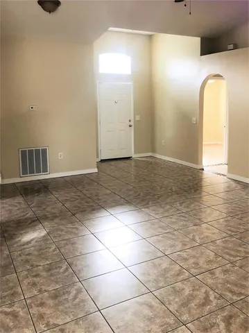 a view of a livingroom with wooden floor