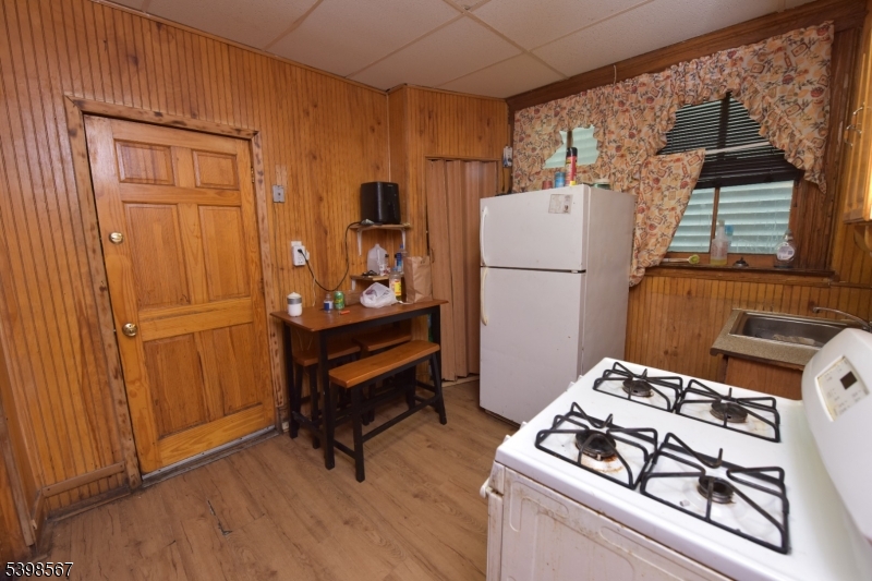 240 Clinton Avenue Jersey City, NJ 07304 - Photo 8 of 14 a room with storage and utility