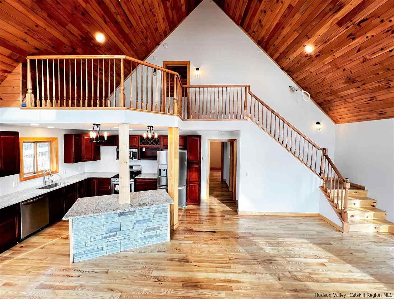 133 Rockefeller Lk Road Cairo, NY 12413 - Photo 5 of 35 a view of entryway dining room and hall with wooden floor