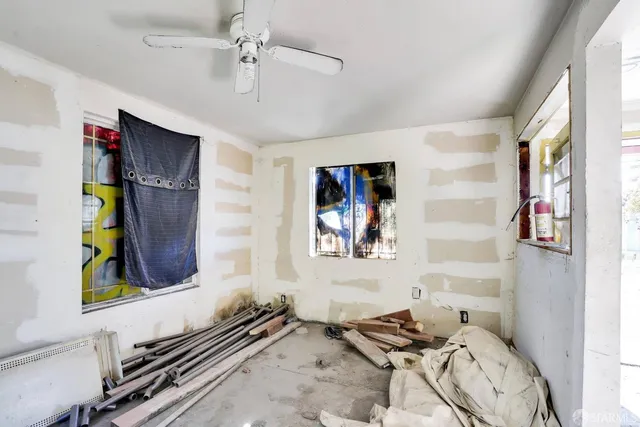 a room with furniture and window