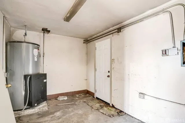 a view of a storage & utility room with closet