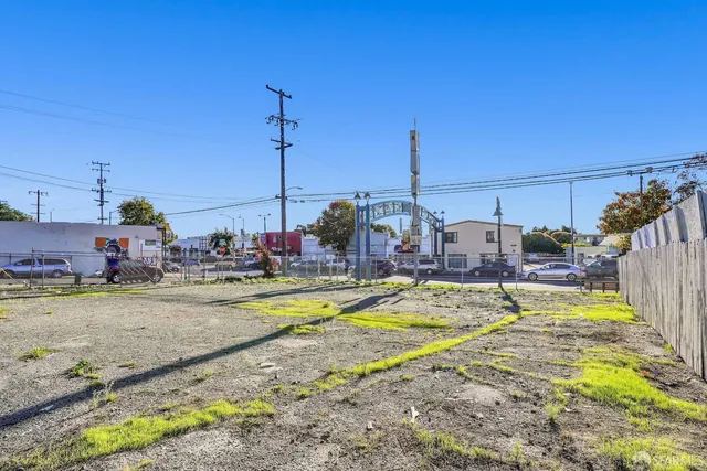 a view of a swimming pool with a yard