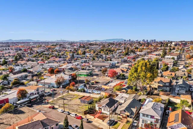 an aerial view of a city with lots of residential buildings