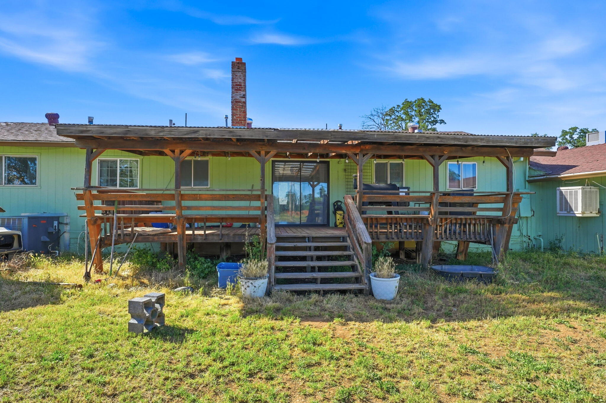 22189 Old Alturas Road Redding, CA 96003 - Photo 37 of 70 a front view of a house with garden