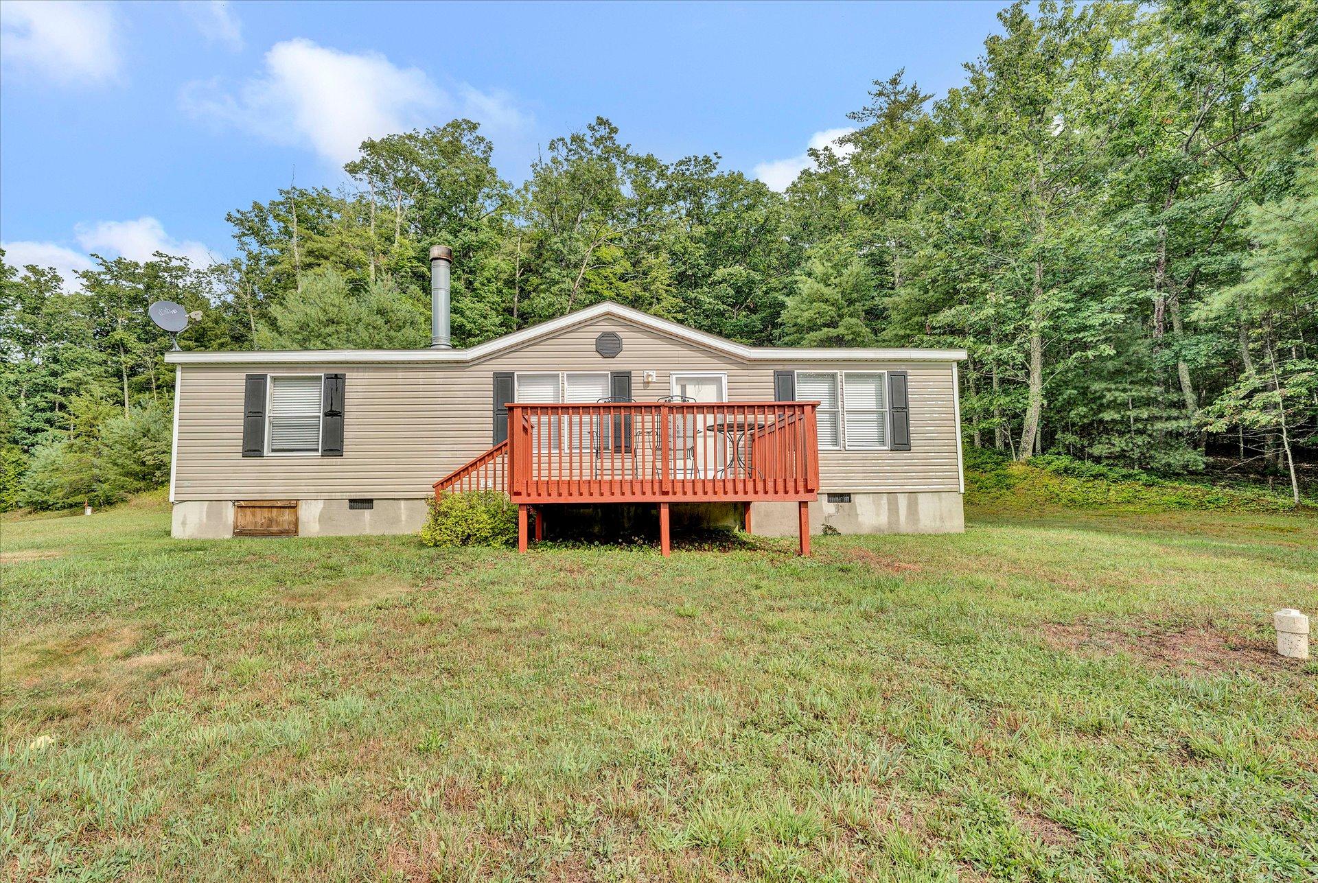 4120 Sunflower Road Pilot, VA 24138 - Photo 22 of 35 a view of a house with a yard