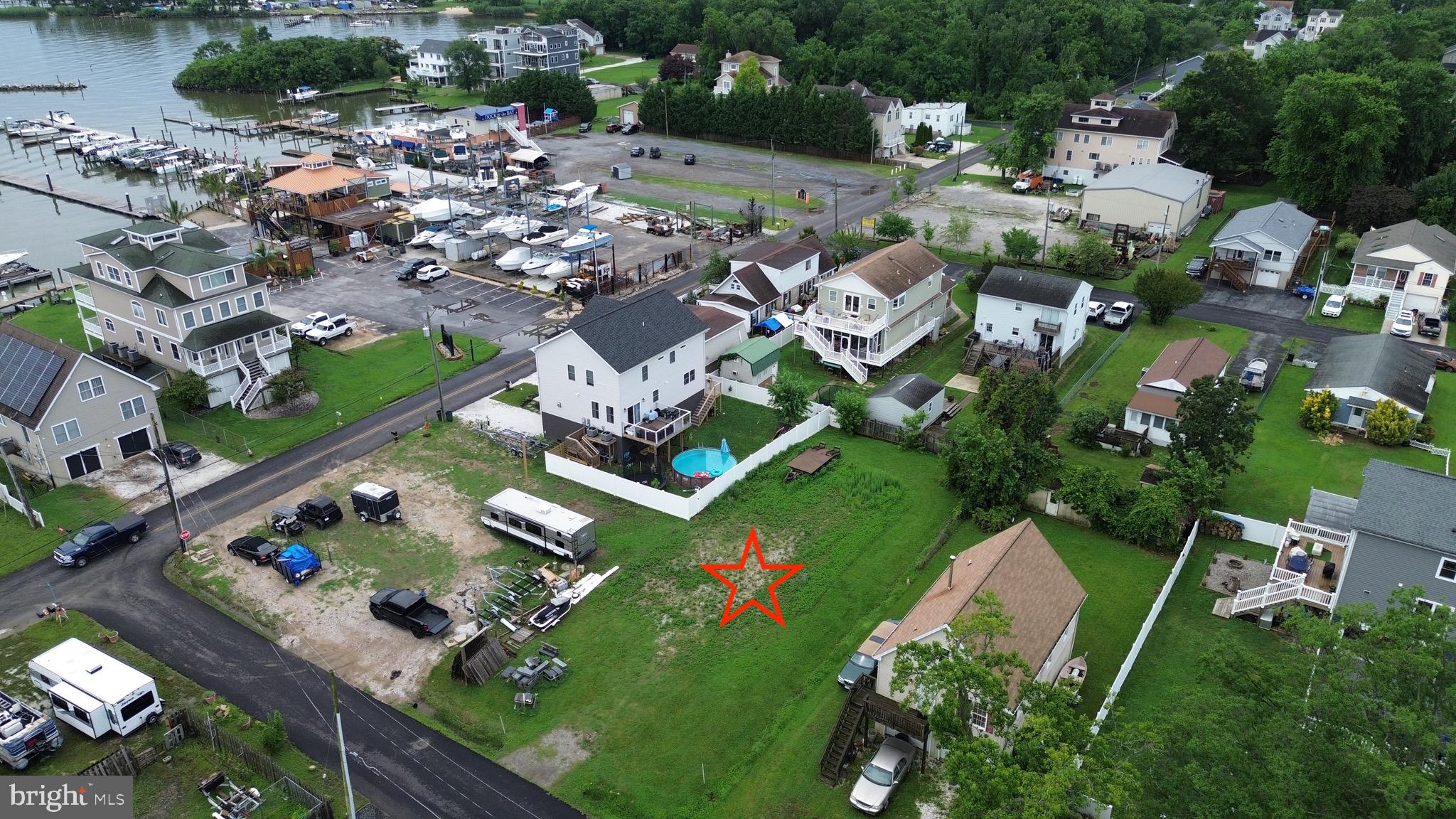 2804 4th Street Sparrows Point, MD 21219 - Photo 7 of 7 an aerial view of multiple houses with yard