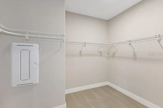 a view of a room with racks on the wall