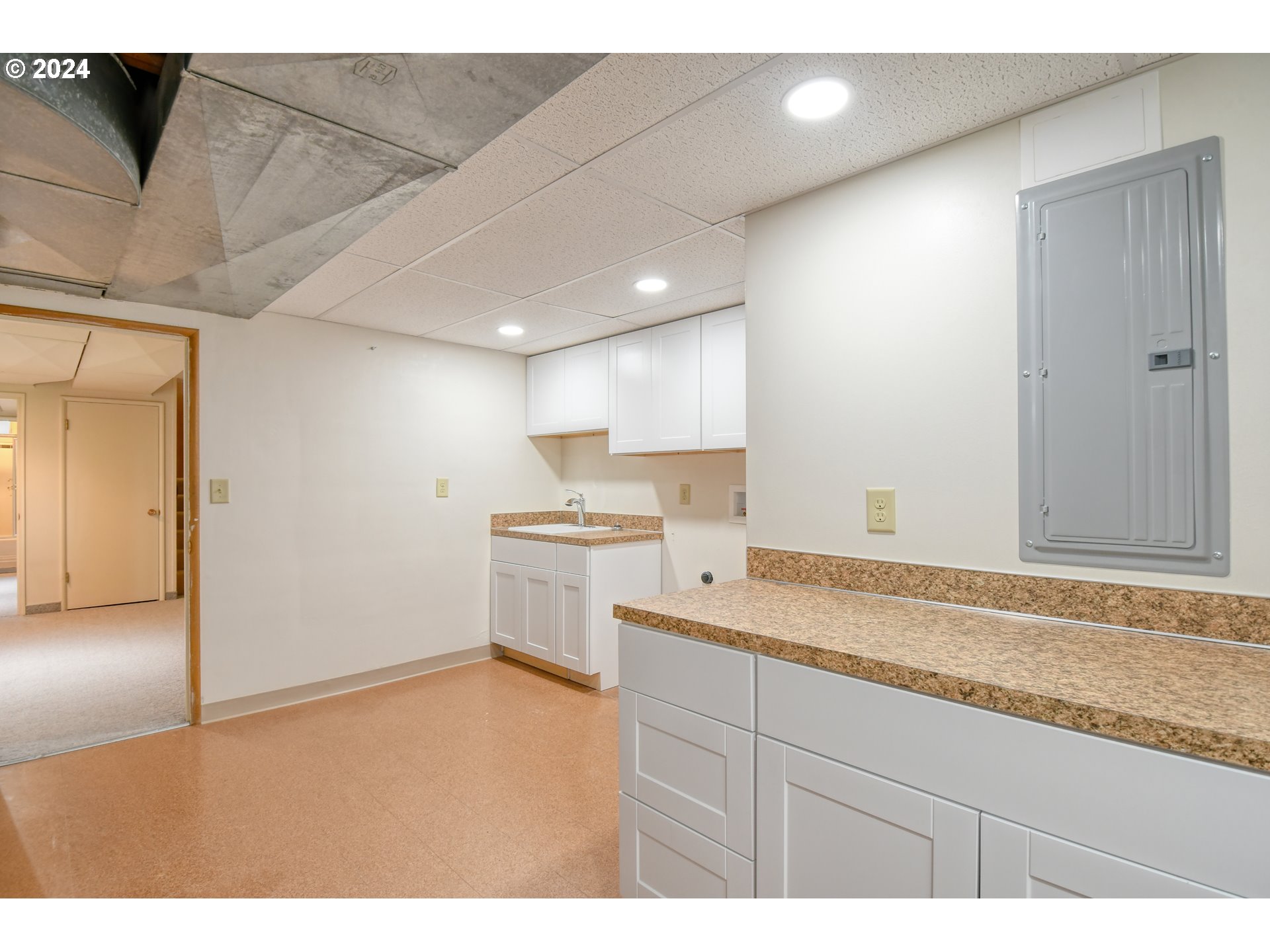 405 Northwest Johns Lane Pendleton, OR 97801 - Photo 34 of 48 a kitchen with a sink and cabinets