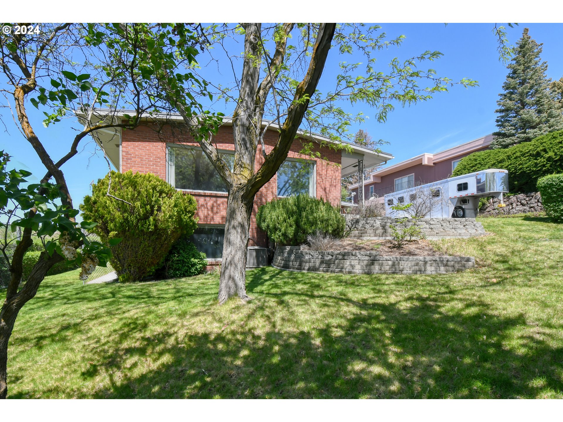 405 Northwest Johns Lane Pendleton, OR 97801 - Photo 38 of 48 a view of a house with a yard