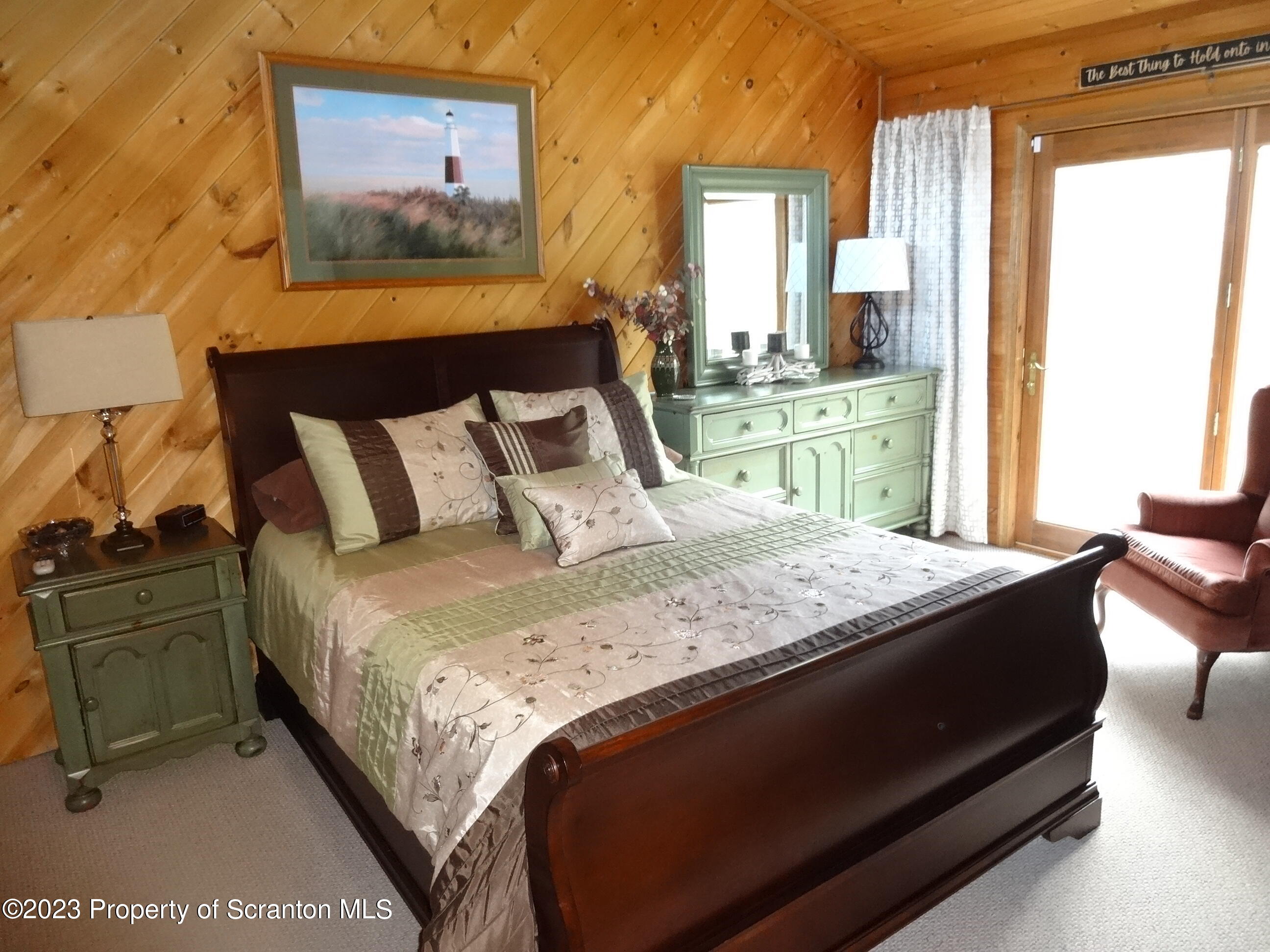 15 Buck River Road Thornhurst, PA 18424 - Photo 21 of 38 a bedroom with a bed and window