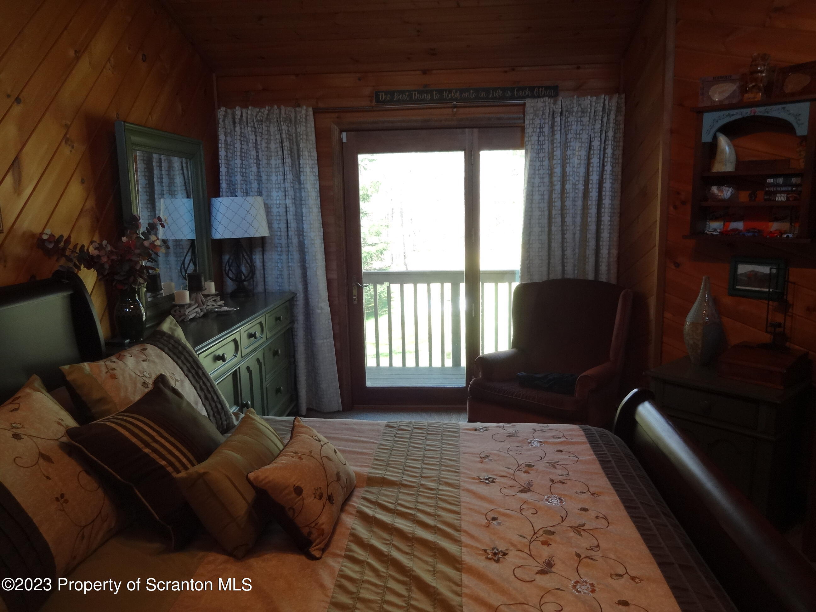 15 Buck River Road Thornhurst, PA 18424 - Photo 23 of 38 a bedroom with furniture and a window