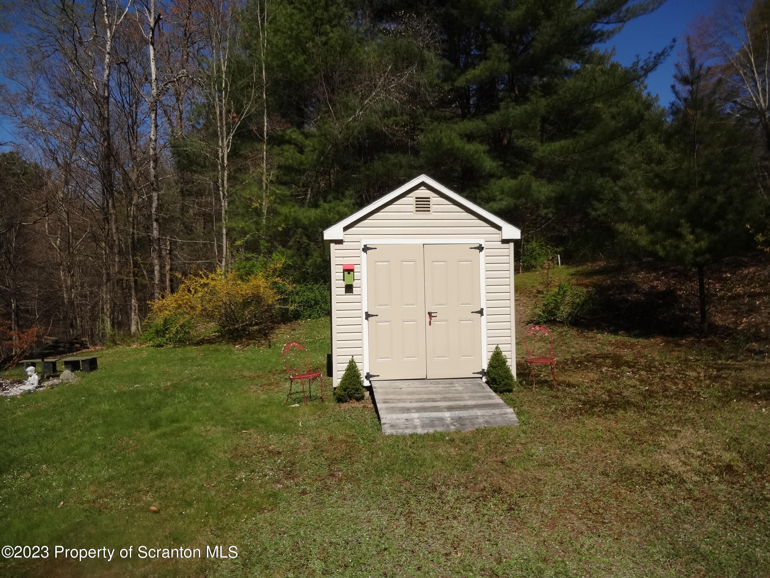 15 Buck River Road Thornhurst, PA 18424 - Photo 32 of 38 a front view of a house with a yard