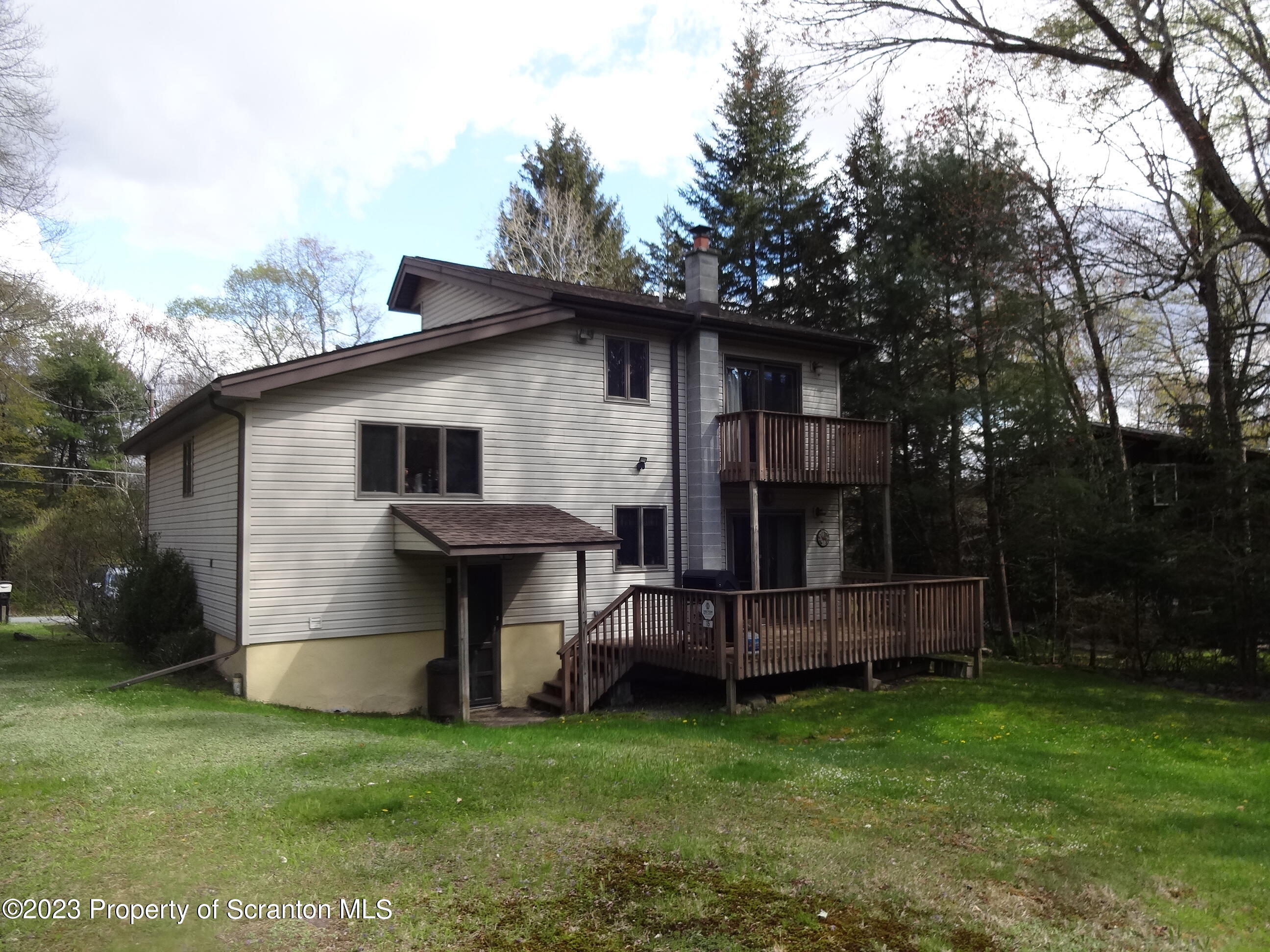15 Buck River Road Thornhurst, PA 18424 - Photo 33 of 38 a view of a house with backyard