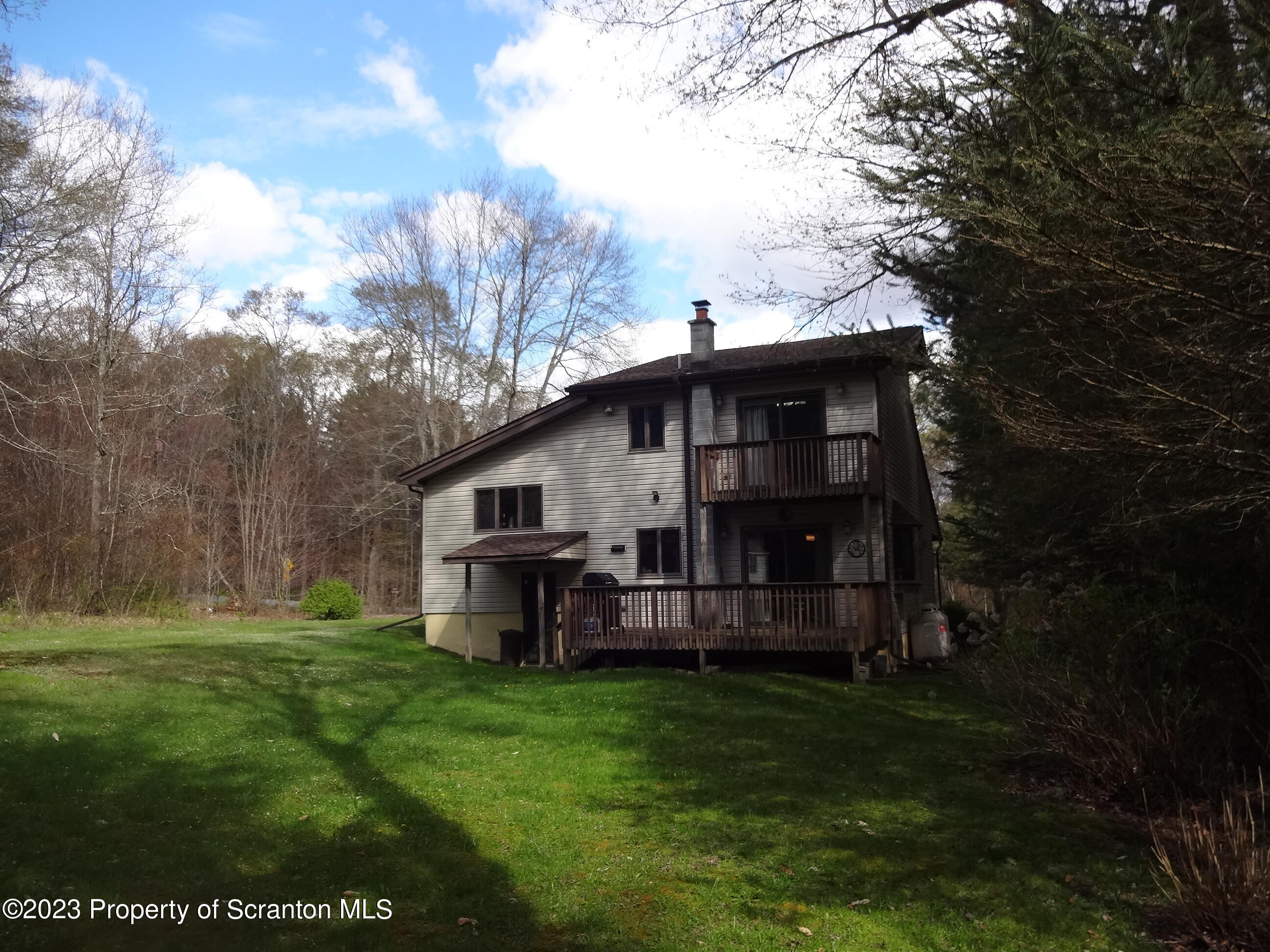 15 Buck River Road Thornhurst, PA 18424 - Photo 34 of 38 a view of a house with backyard