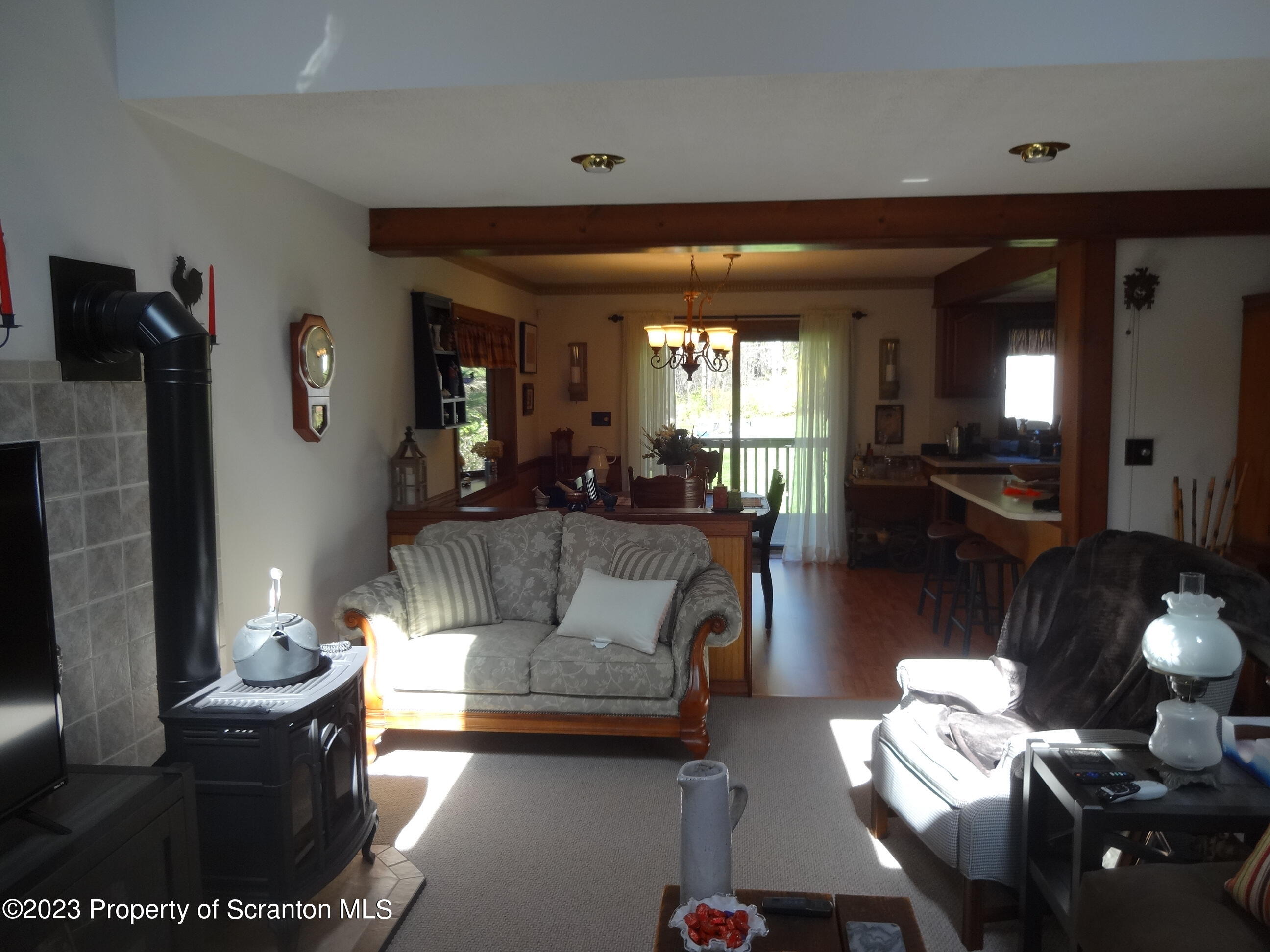 15 Buck River Road Thornhurst, PA 18424 - Photo 6 of 38 a living room with furniture and wooden floor