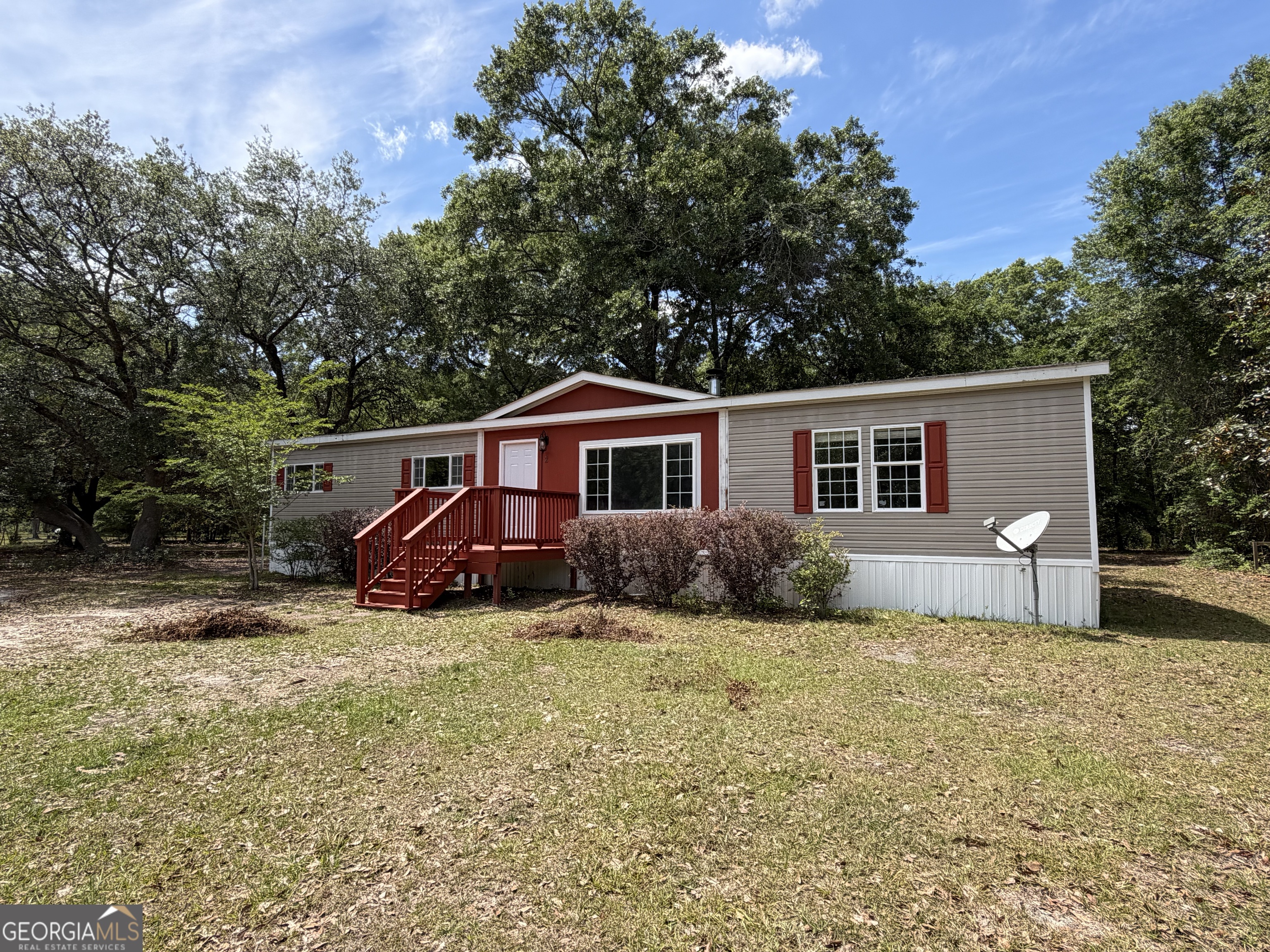 2 Buckboard Trail Jesup, GA 31546 - Photo 1 of 39 a view of house with backyard