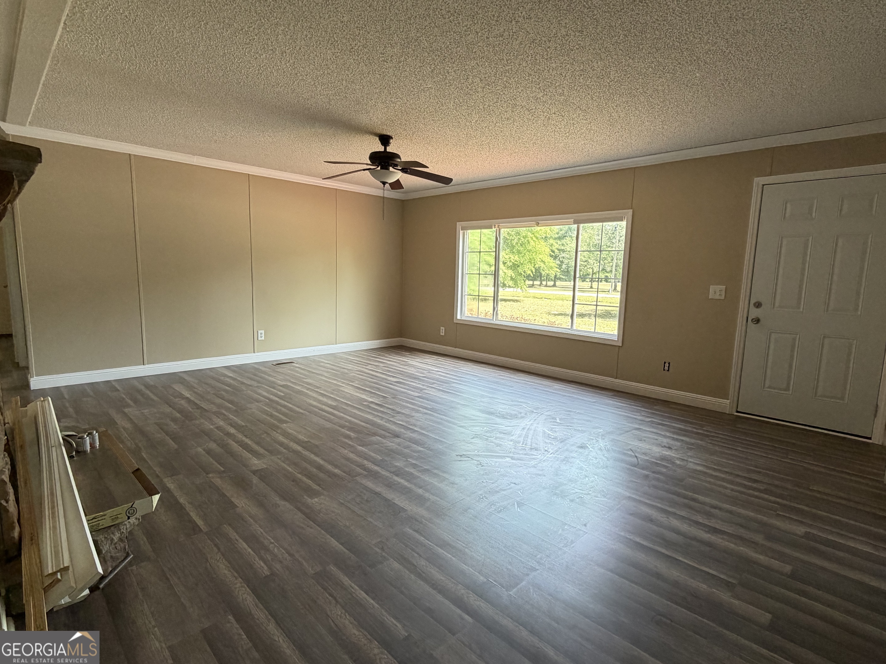 2 Buckboard Trail Jesup, GA 31546 - Photo 15 of 39 a view of empty room with wooden floor and fan