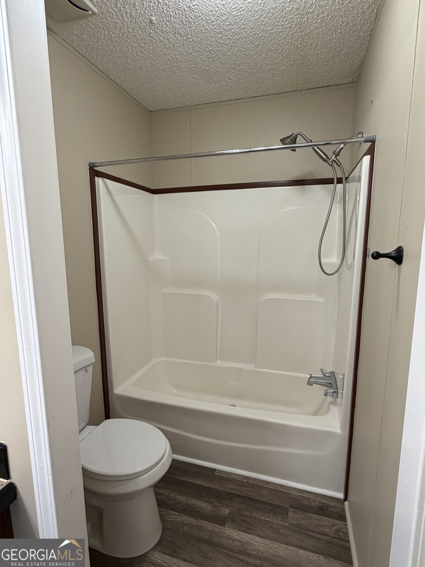 2 Buckboard Trail Jesup, GA 31546 - Photo 22 of 39 a bathroom with a shower and a toilet