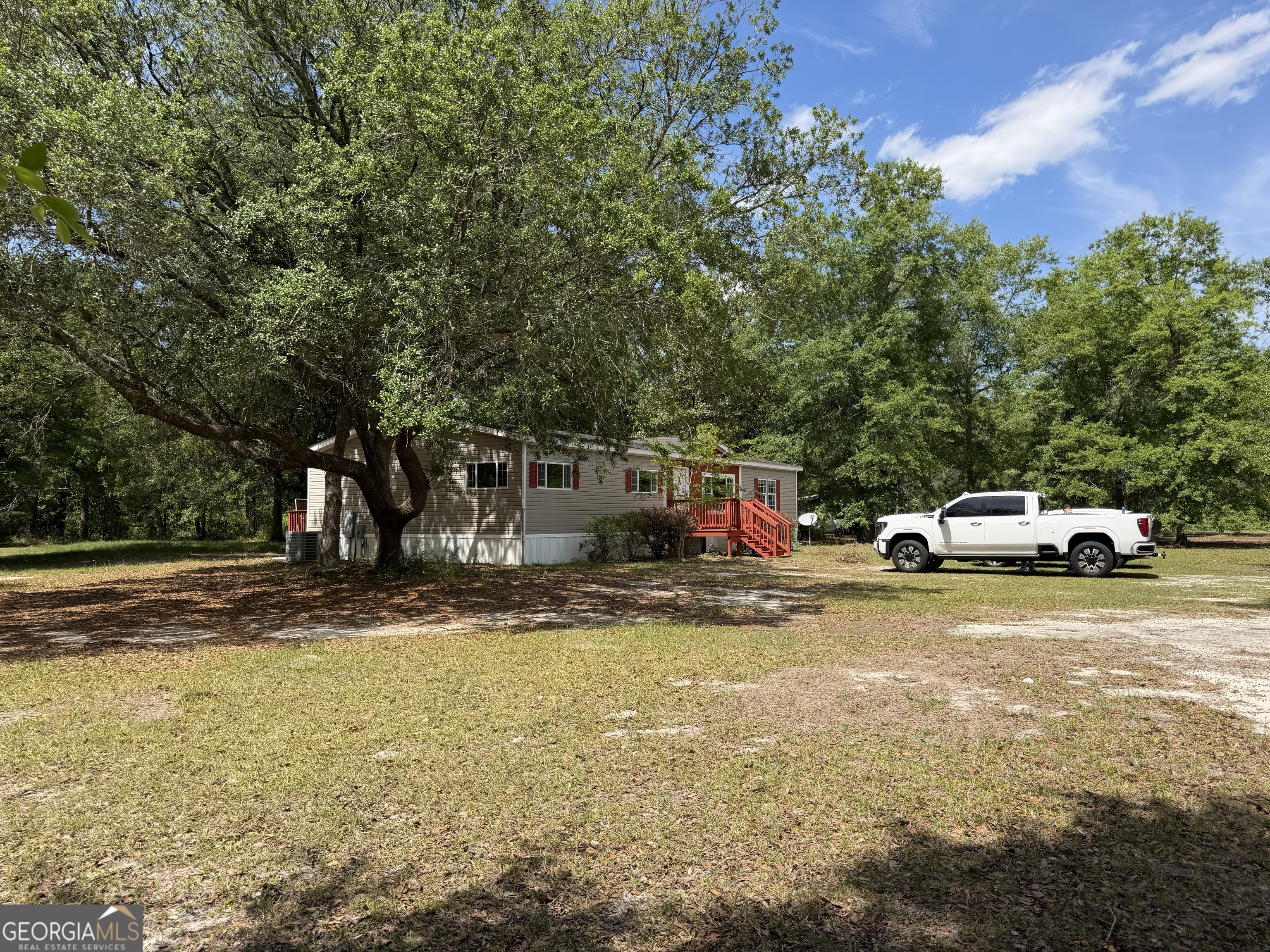2 Buckboard Trail Jesup, GA 31546 - Photo 24 of 39 a view of street with parked cars