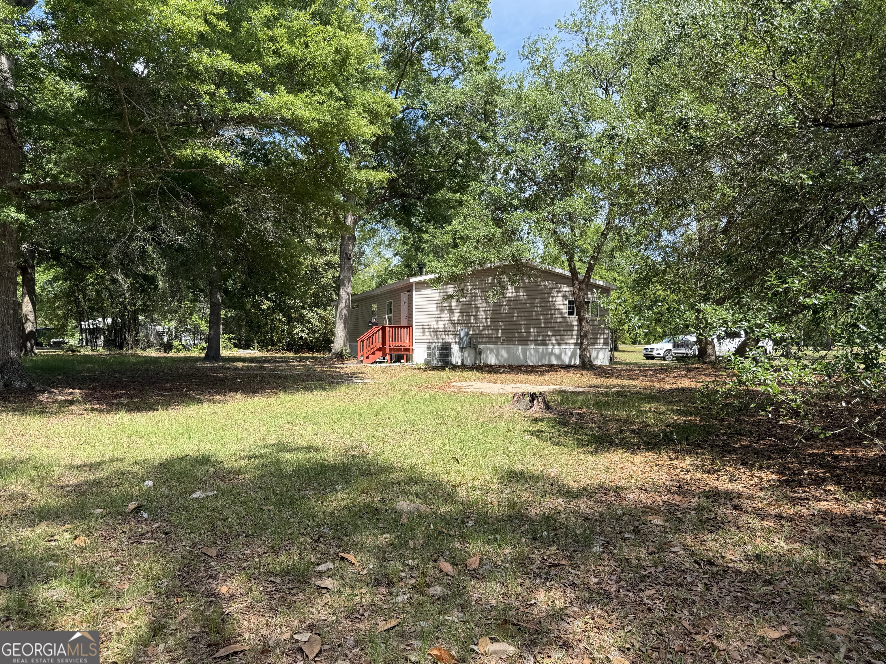 2 Buckboard Trail Jesup, GA 31546 - Photo 28 of 39 a view of yard with tree