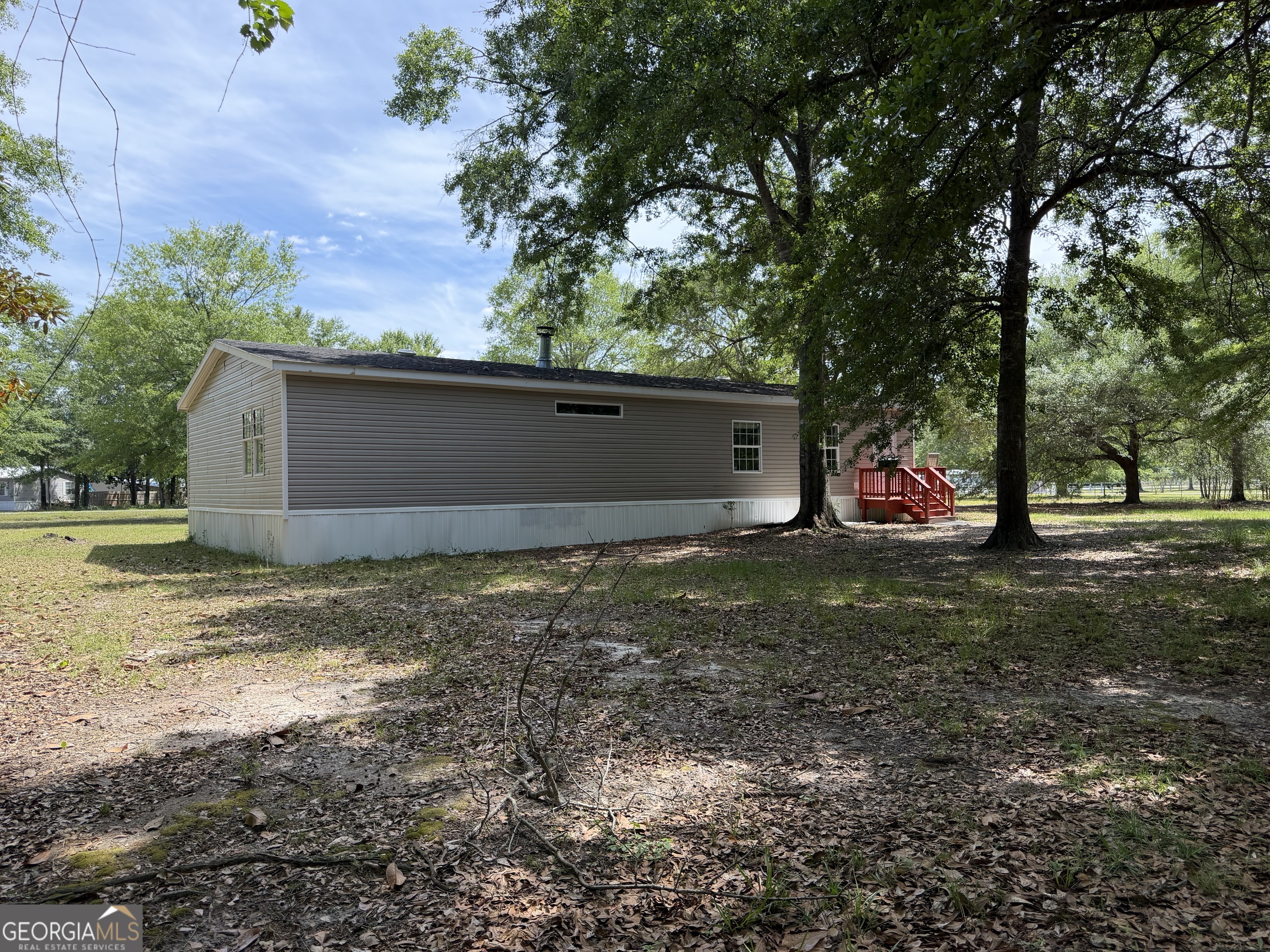 2 Buckboard Trail Jesup, GA 31546 - Photo 38 of 39 a view of outdoor space yard and garage