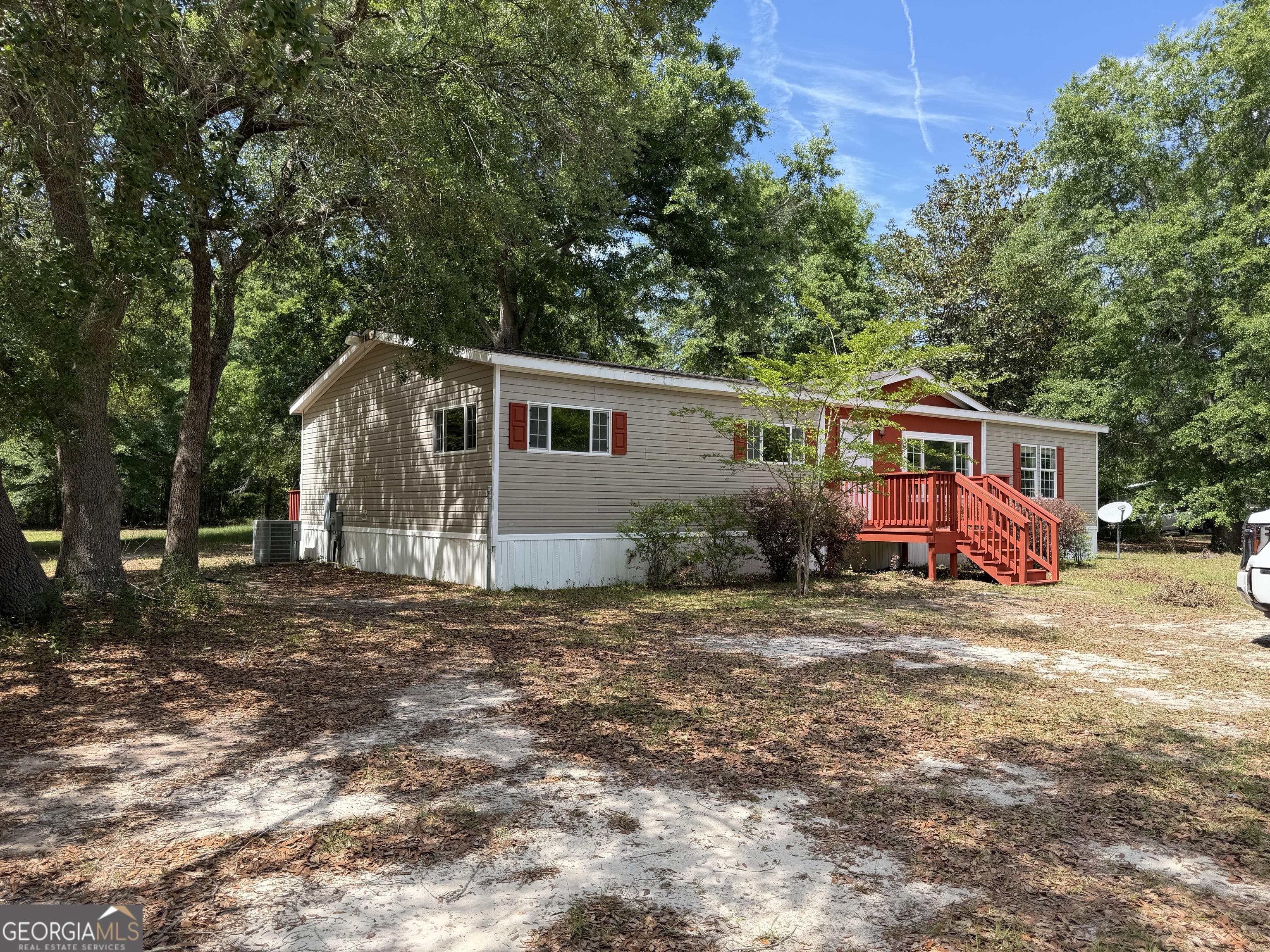 2 Buckboard Trail Jesup, GA 31546 - Photo 4 of 39 a view of a house with a patio