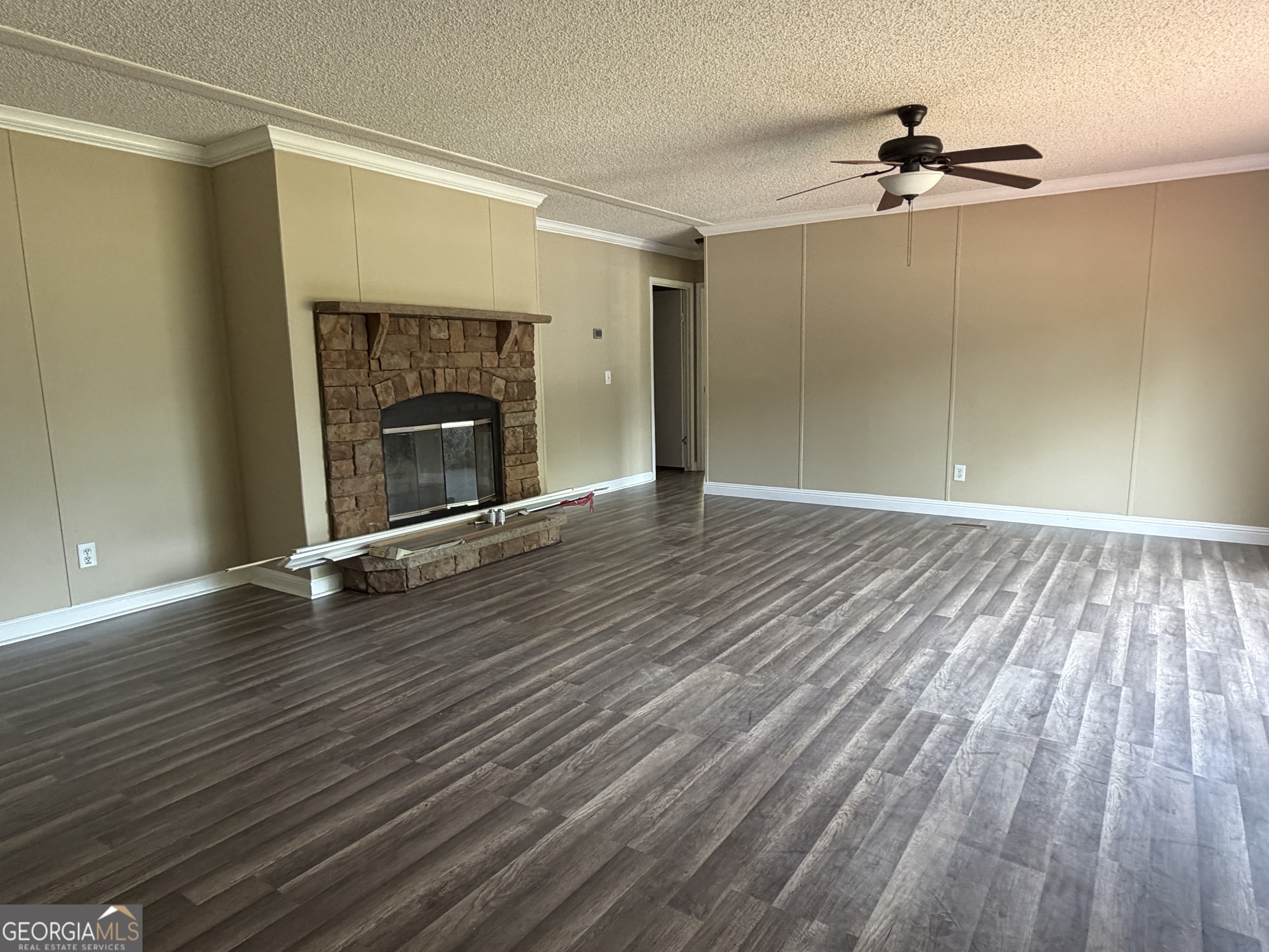 2 Buckboard Trail Jesup, GA 31546 - Photo 7 of 39 a view of an empty room with wooden floor