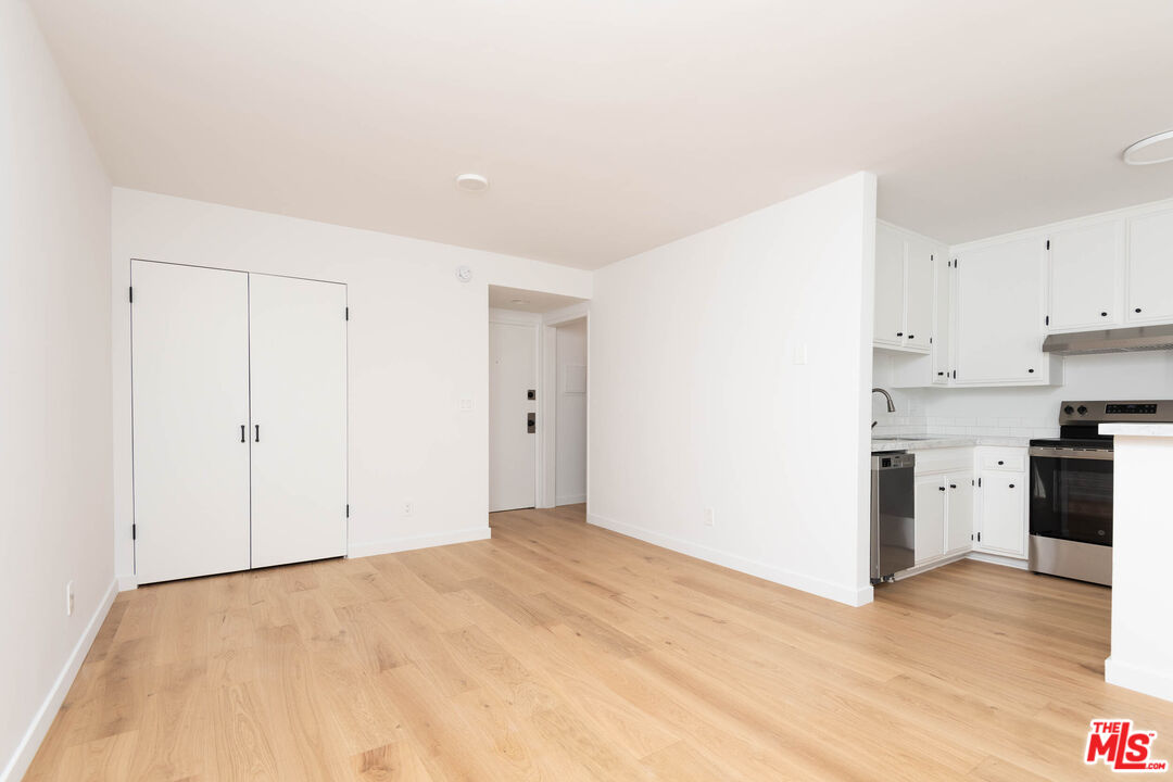 5935 Chula Vista Way, Unit 103 Los Angeles, CA 90068 - Photo 4 of 12 a view of kitchen with wooden floor