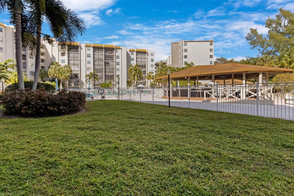 3910 Inverrary Boulevard, Unit 301B Lauderhill, FL 33319 - Photo 33 of 44 a view of a house with a garden