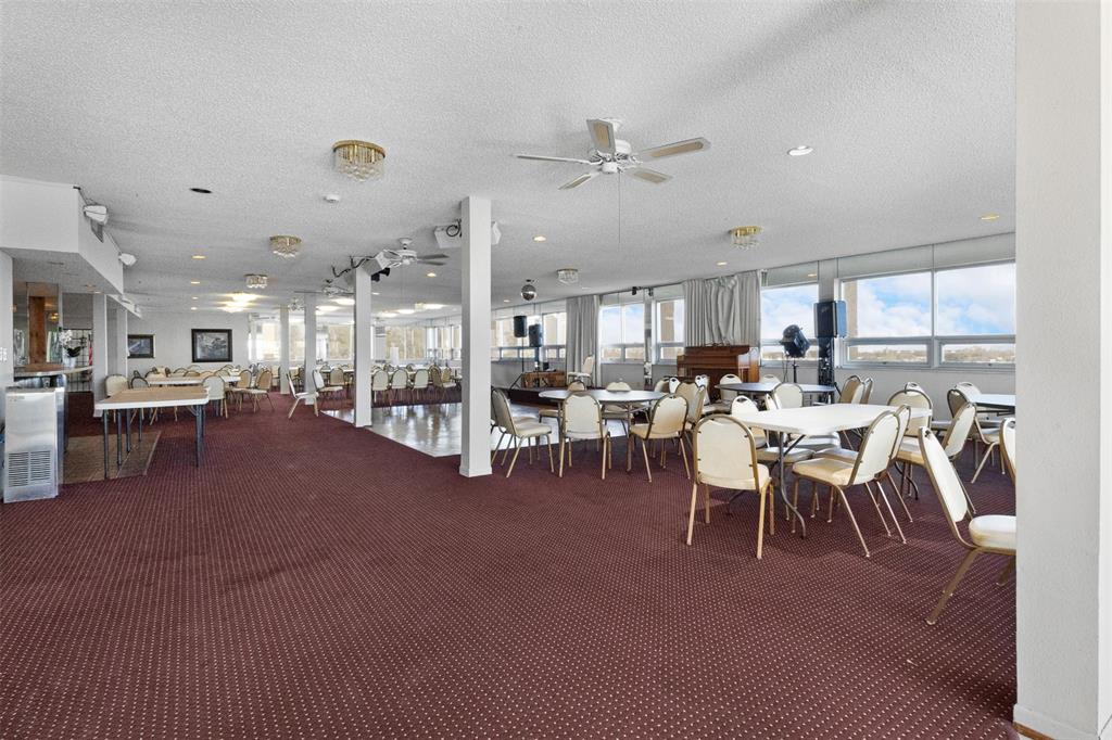 3910 Inverrary Boulevard, Unit 301B Lauderhill, FL 33319 - Photo 35 of 44 a living room with lots of furniture and a large window