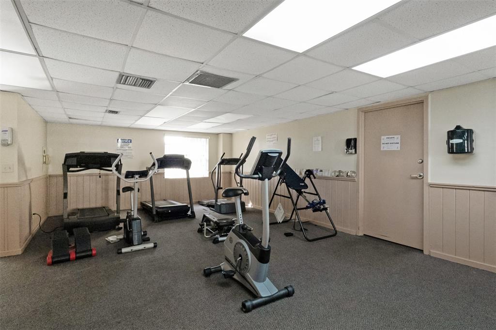 3910 Inverrary Boulevard, Unit 301B Lauderhill, FL 33319 - Photo 37 of 44 a view of a room with gym equipment
