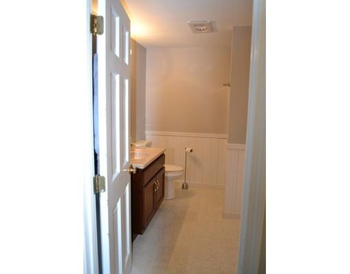21 Middle Road Amesbury, MA 01913 - Photo 13 of 21 a bathroom with a sink and a mirror