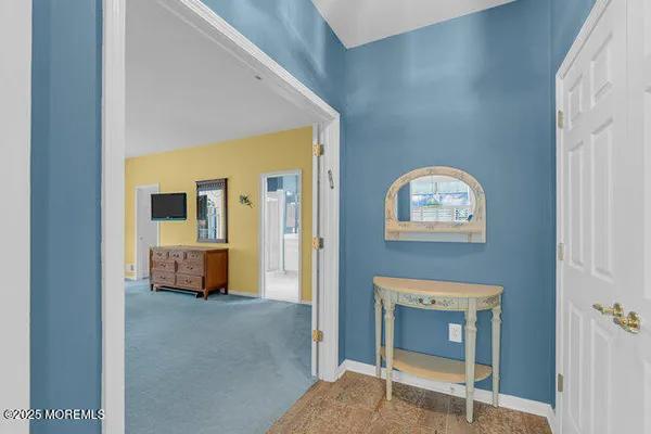 a view of livingroom with furniture and windows