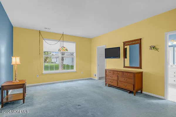 a view of livingroom with furniture wooden floor and window