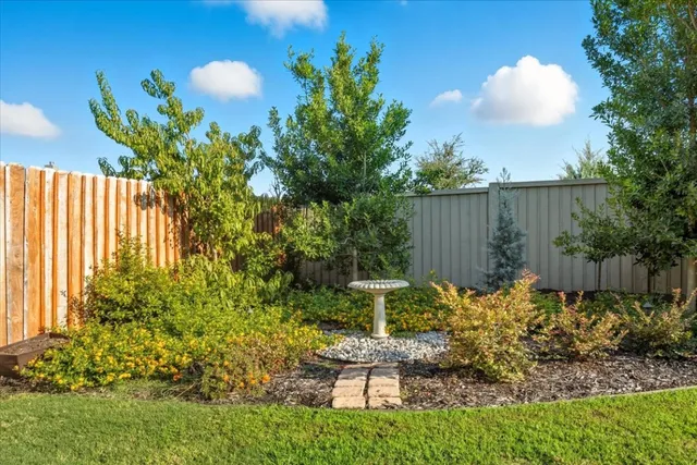 a garden view with a seating space
