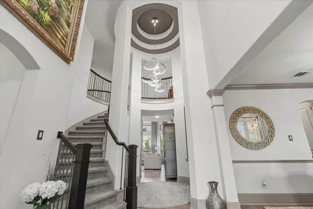 a view of a hallway with washer and dryer