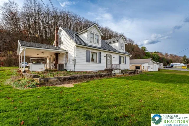 a house view with a garden space