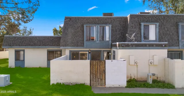 a picture of a bench in front of a door