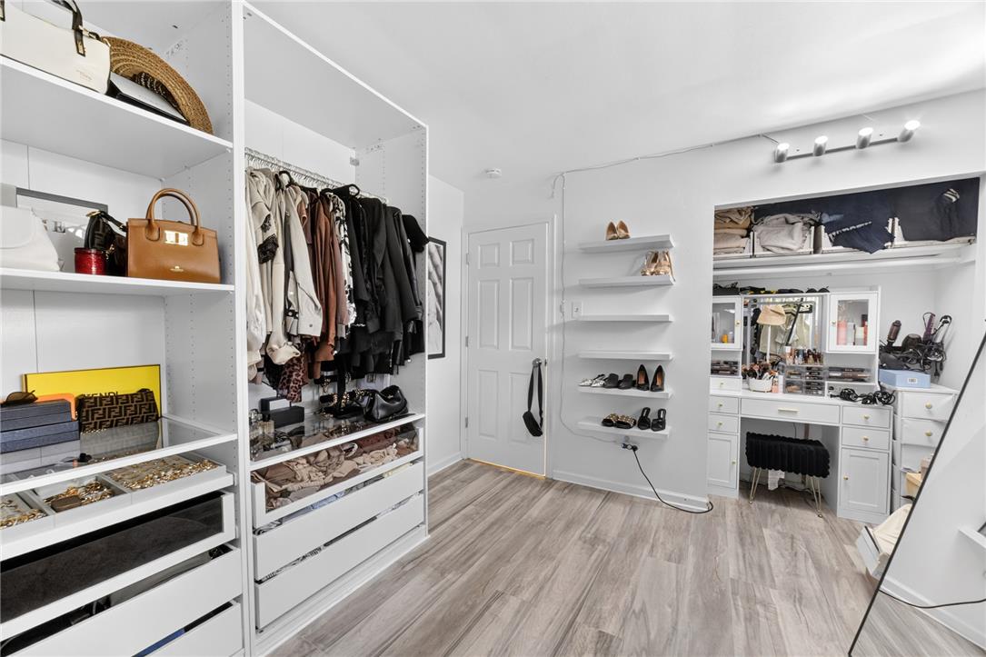 7290 Heather Road Macungie, PA 18062 - Photo 26 of 39 Customizable closet systems with integrated drawer storage create an organized dressing space.