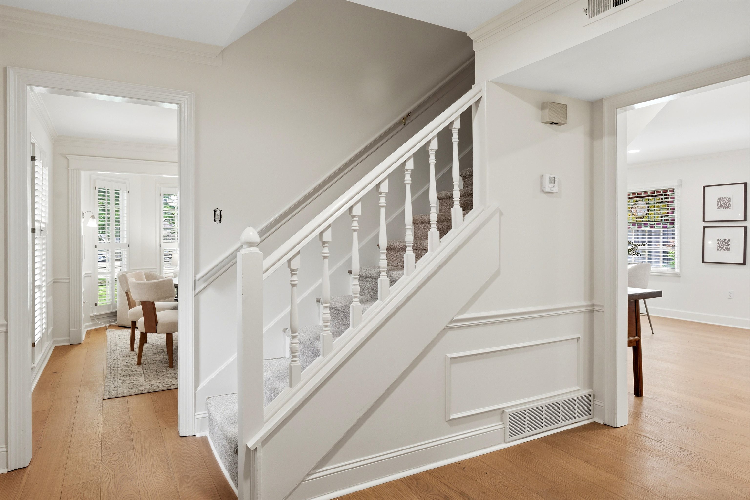 1984 Allenby Road Germantown, TN 38139 - Photo 9 of 37 Staircase with white balusters and carpeted treads