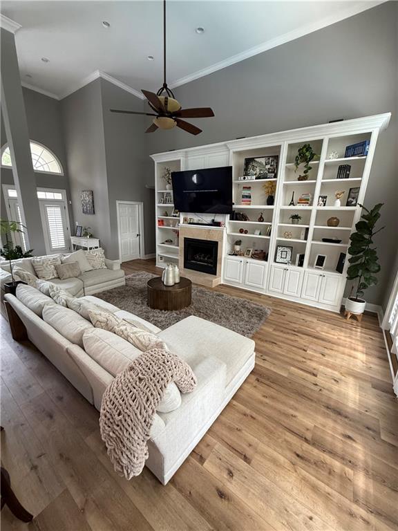 4632 Ridgeview Circle Valdosta, GA 31602 - Photo 16 of 70 a living room with furniture a fireplace and a flat screen tv