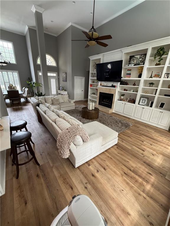 4632 Ridgeview Circle Valdosta, GA 31602 - Photo 17 of 70 a living room with furniture a flat screen tv and kitchen view