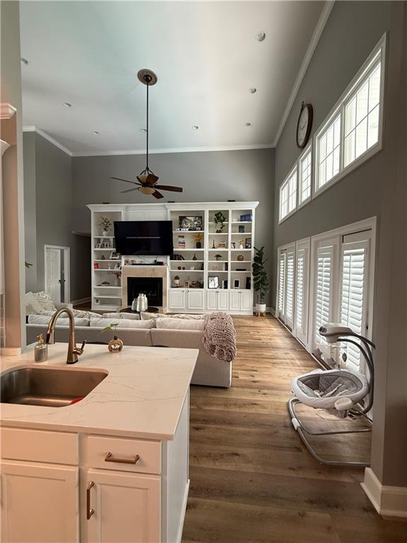 4632 Ridgeview Circle Valdosta, GA 31602 - Photo 22 of 70 a living room with furniture a fireplace and a large window