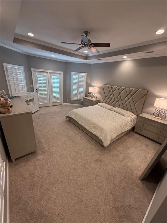 4632 Ridgeview Circle Valdosta, GA 31602 - Photo 26 of 70 a spacious bedroom with a bed and a chandelier