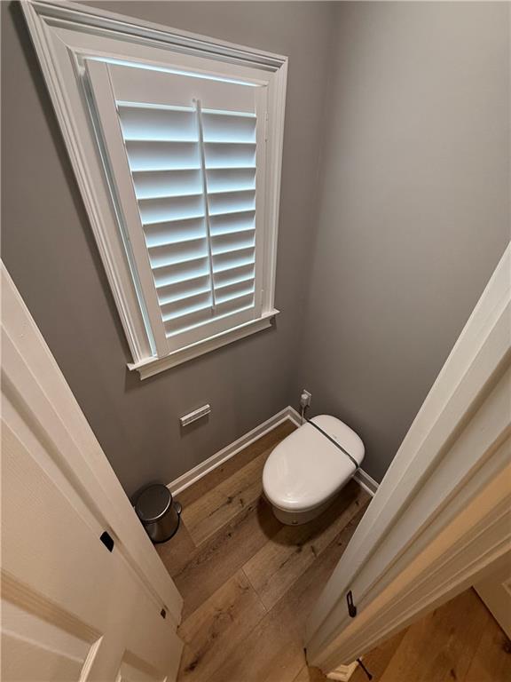 4632 Ridgeview Circle Valdosta, GA 31602 - Photo 35 of 70 a bathroom with a granite countertop sink toilet a mirror and shower